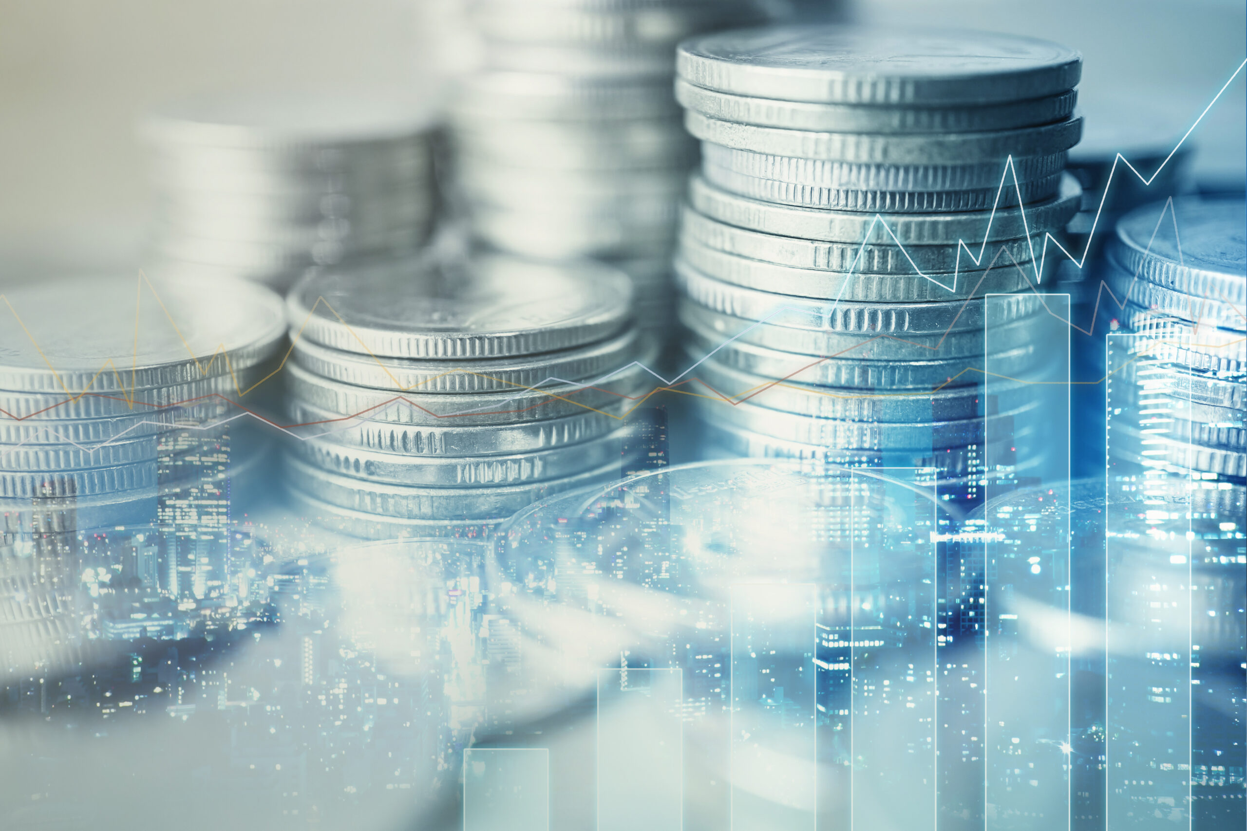 Stacks of coins with bar graphs and statistics representing shipping costs 