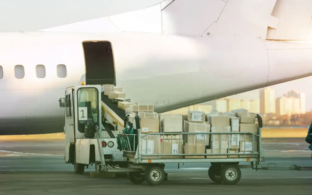 Airplane with vehicles loading parcels for international shipping for Shopify orders