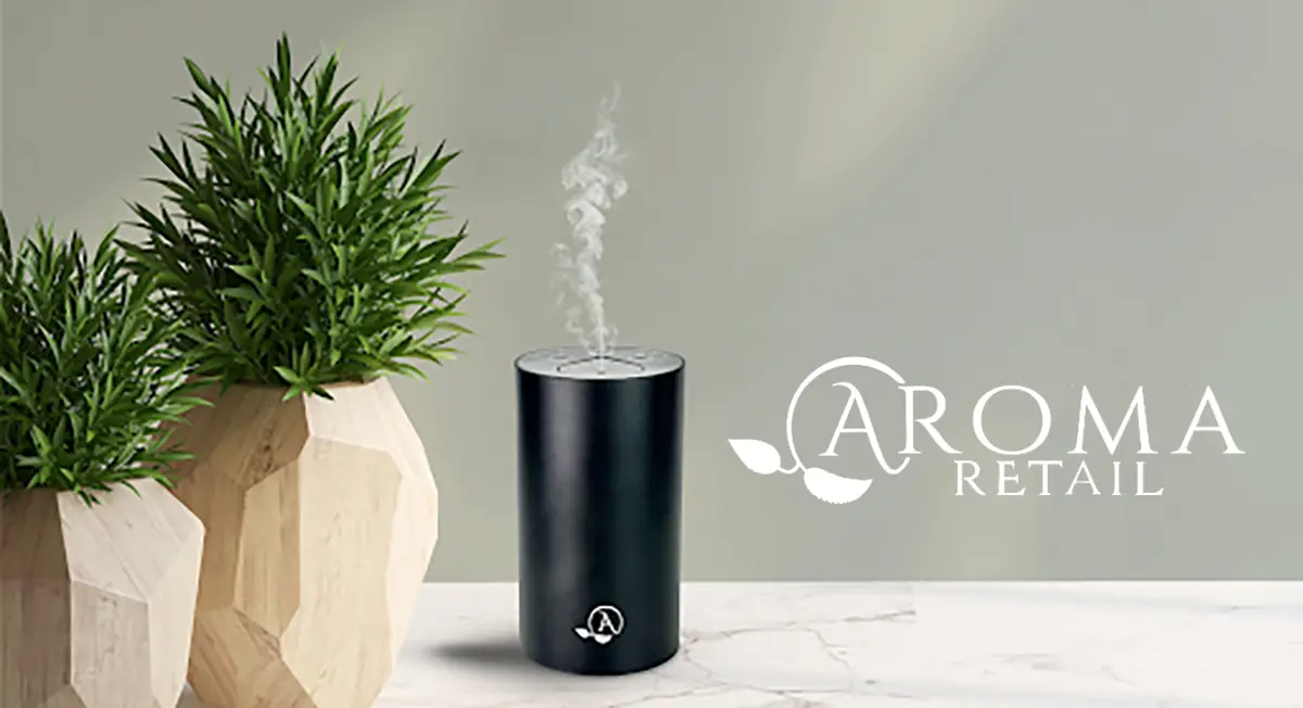 Aroma Retail logo and environmental scenting diffuser with plant decor